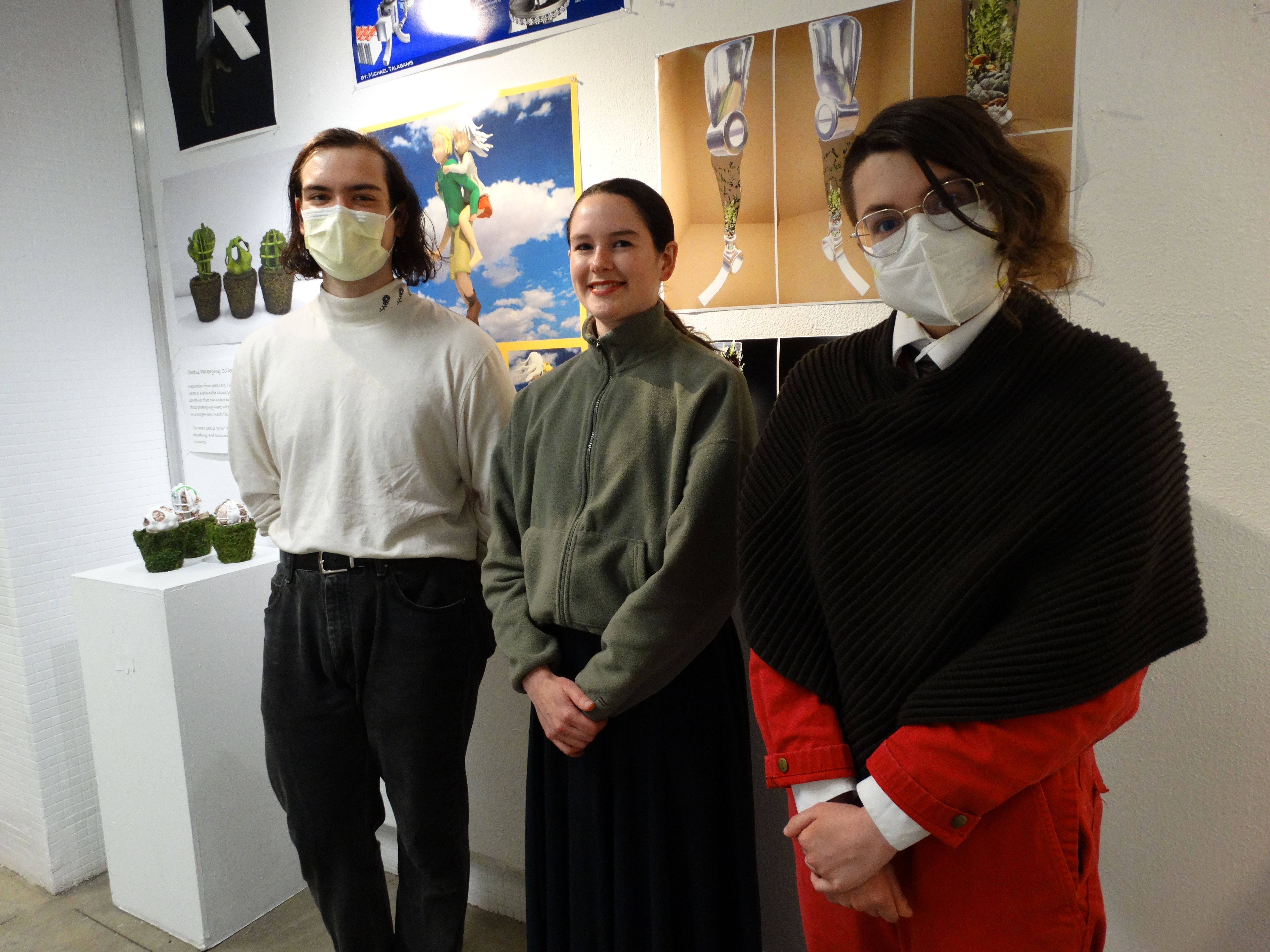 Three people wearing face masks 
