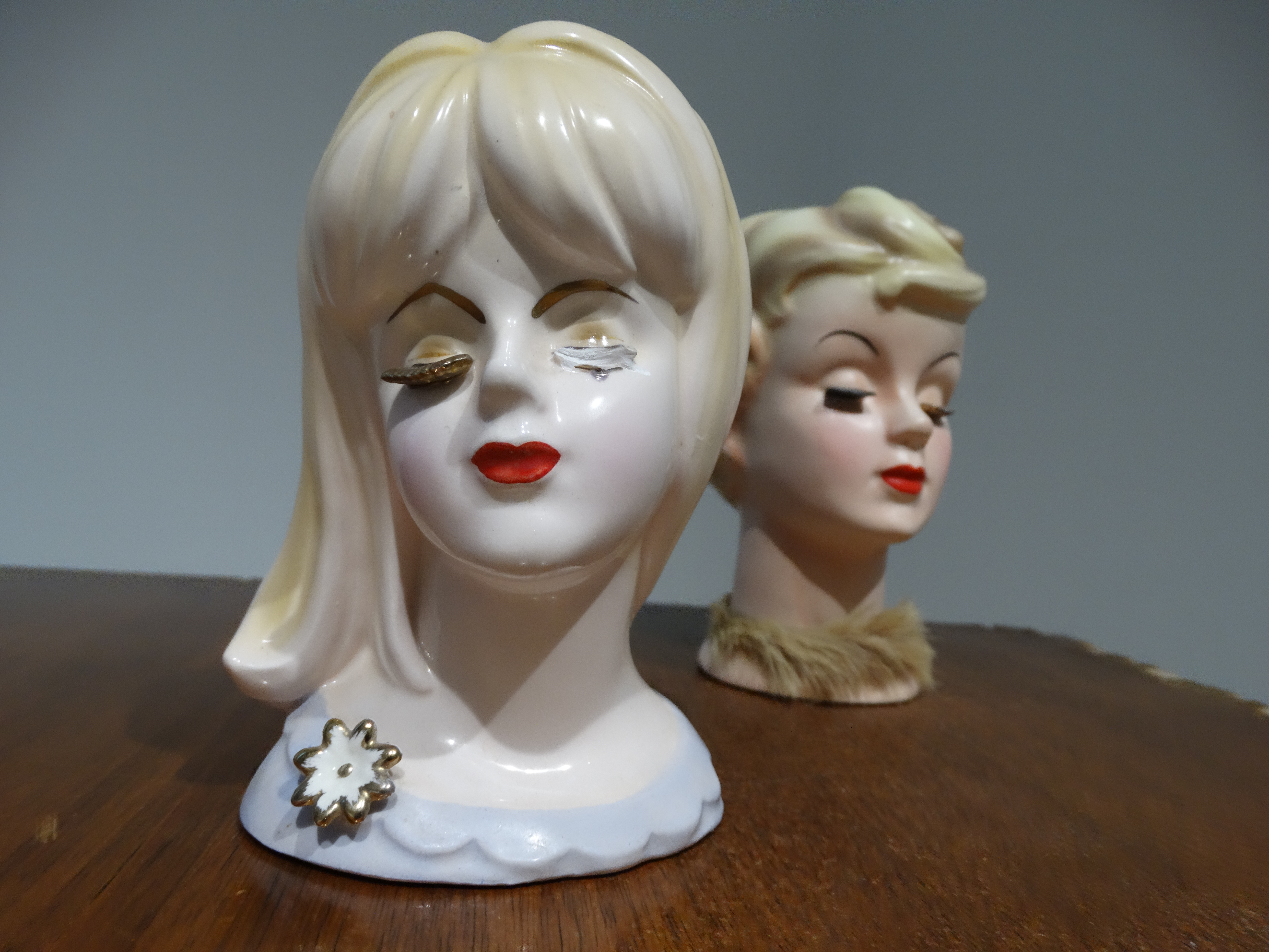 Photograph of two ceramic heads
