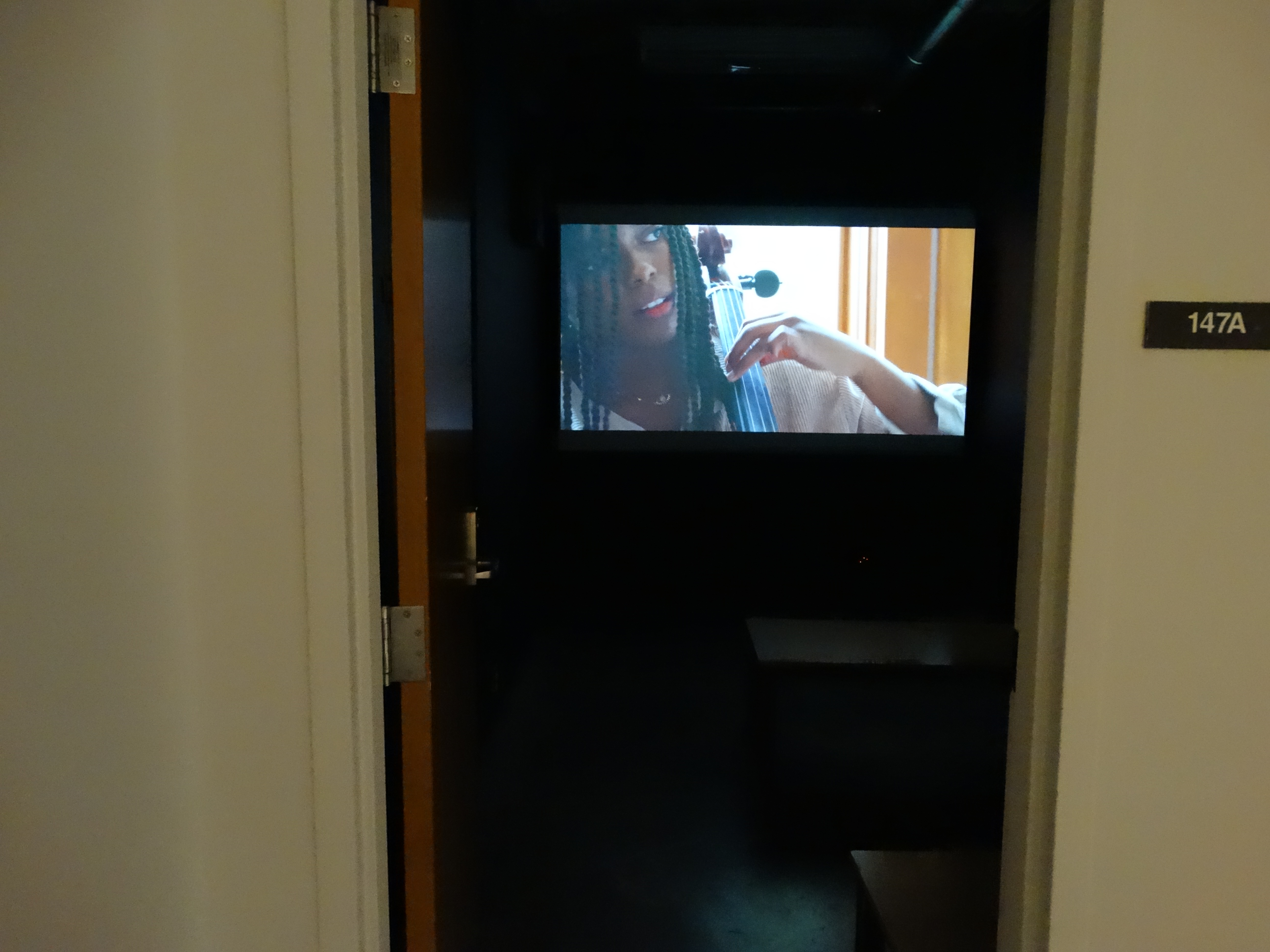 Film screen inside black box screening room
