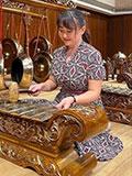 Woman playing instrument