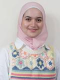 Smiling person wearing pink headscarf