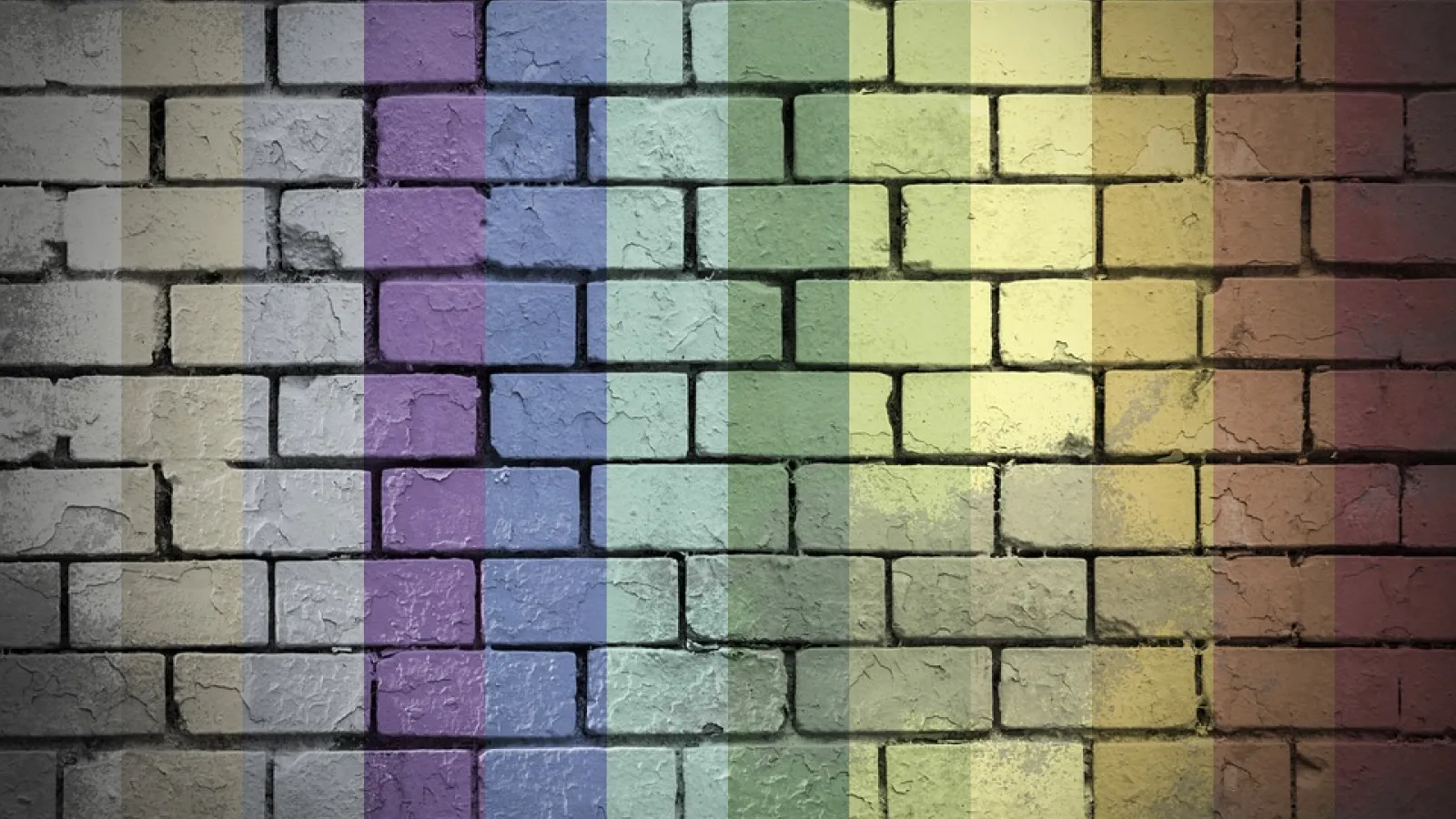 wall with lgbtq colors projected on it
