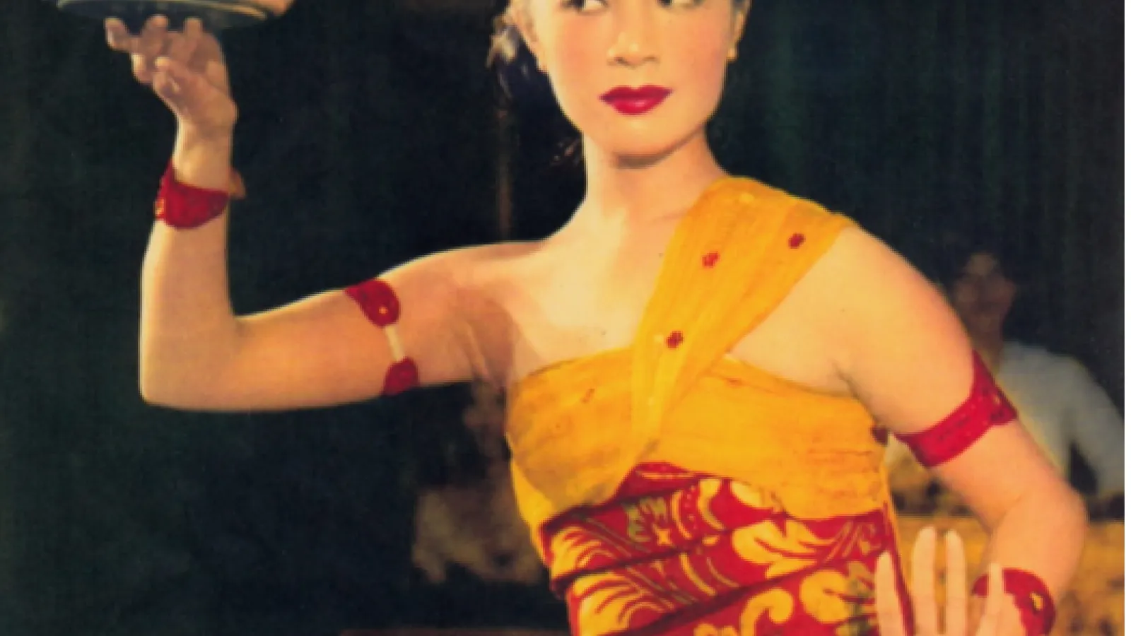 Woman in Traditional Indonesian Dress Dancing