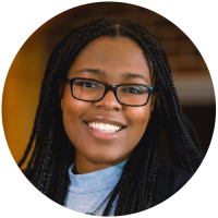 Photograph of African American woman with long hair and glasses