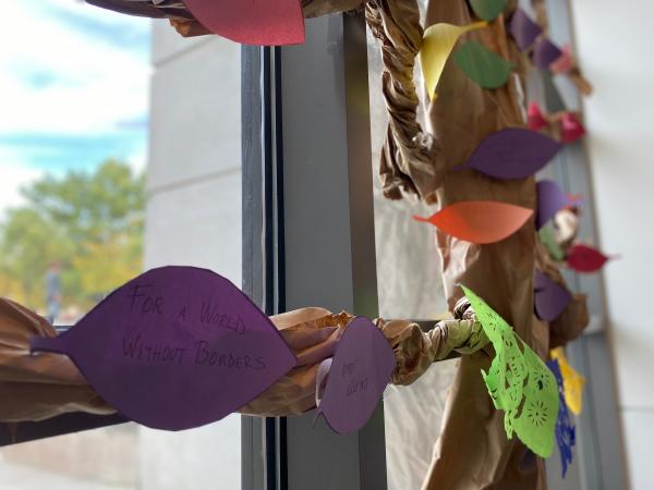 Photograph of wishing tree with handwritten wishes