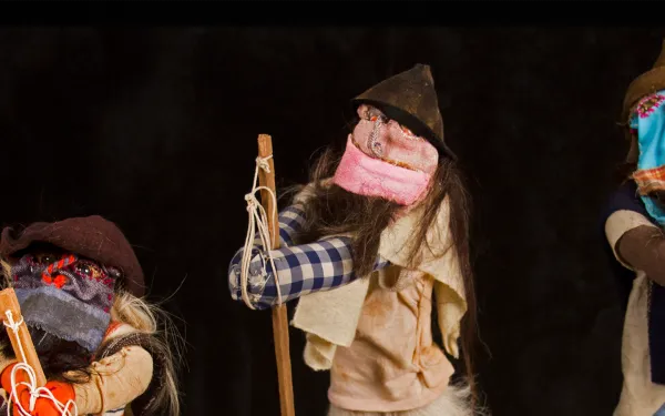 Three crafted human figures