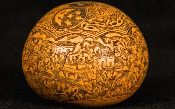 Andean etched story gourd