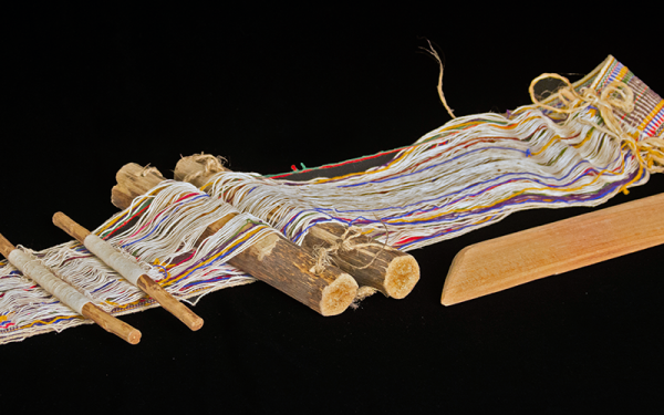 Awana (back strap loom) for weaving fajas or chumpi belts, Chinchero, Peru. 