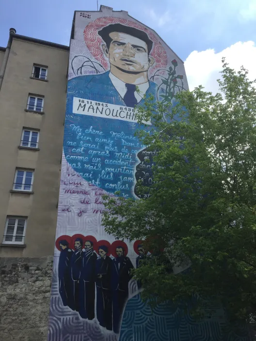 Mural of a man on the side of a building