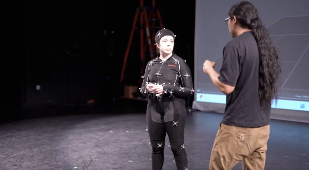Ati Cachimuel and Dance Department student working with motion-capture technology at ACCAD Motion Lab