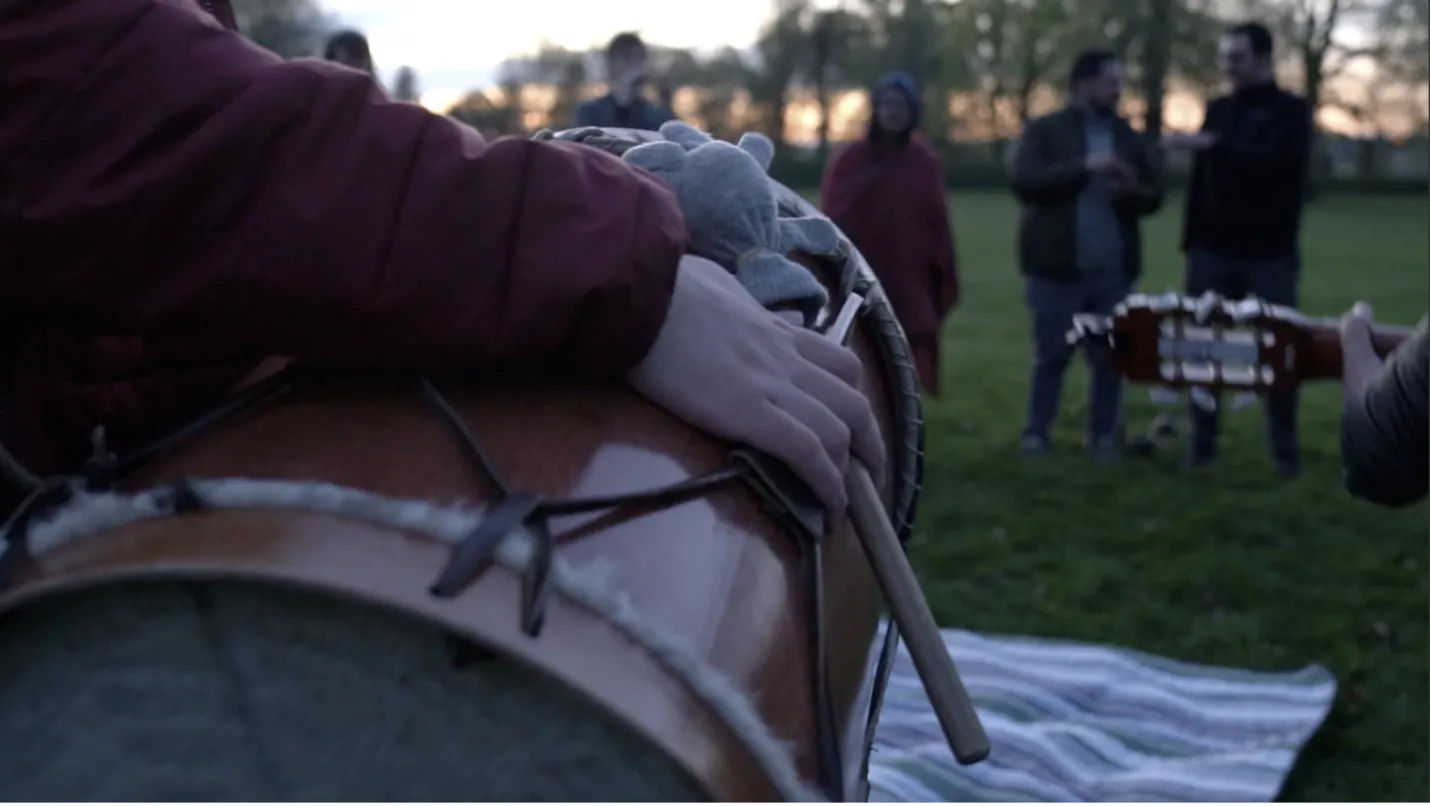Students and collaborators gather at the Great Circle Mound in Newark for a predawn musical performance.