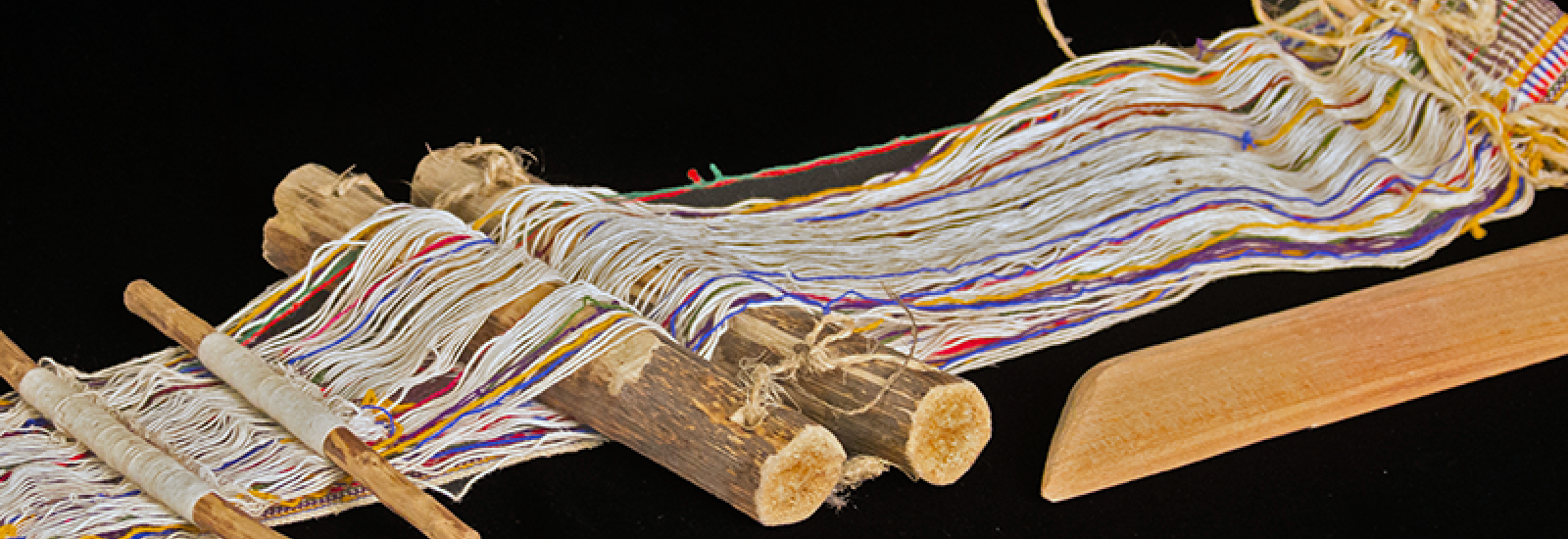 Awana (back strap loom) for weaving fajas or chumpi belts, Chinchero, Peru. 