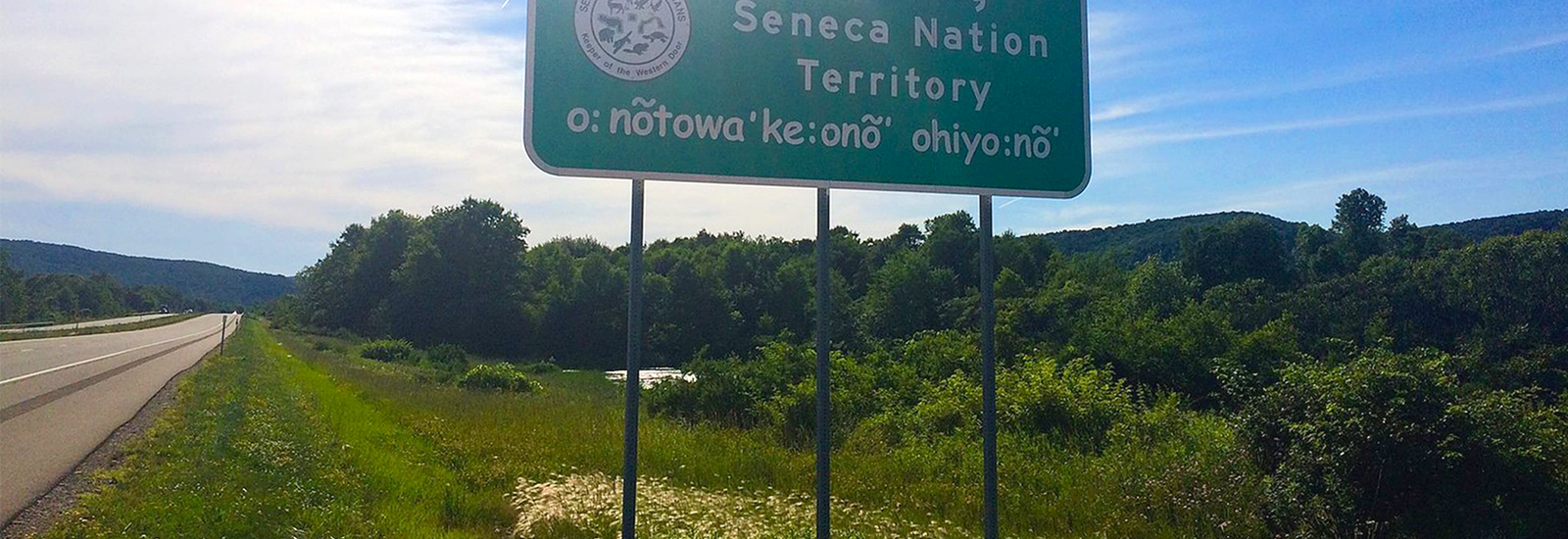 Photograph of road sign with text that reads "Entering Seneca Nation Territory"