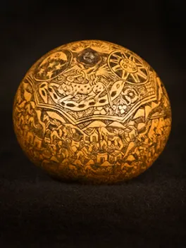 Ball etched with an outdoor scene