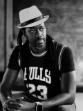 Man wearing Bull jersey and white hat